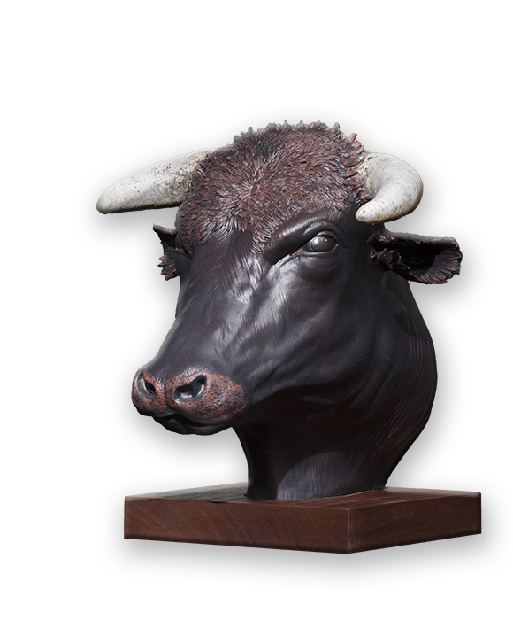 Figurative ceramic sculpture of a Bull