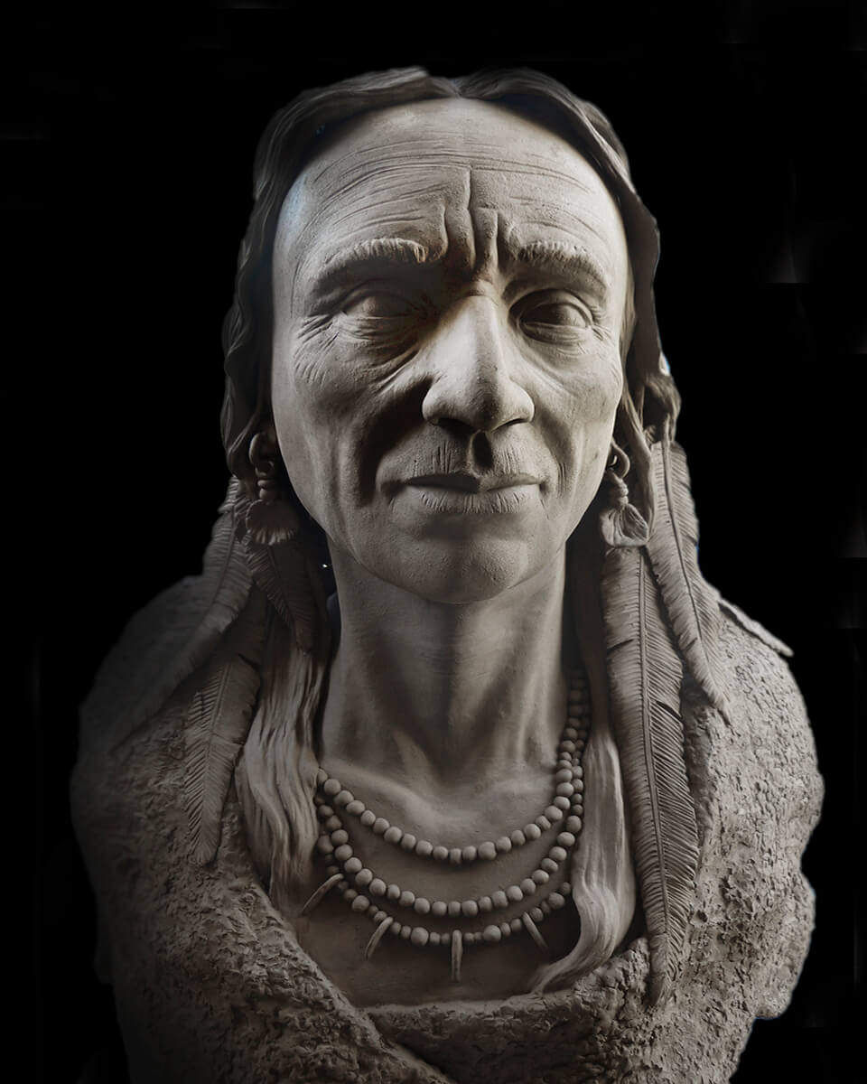 Figurative ceramic sculpture of a native american