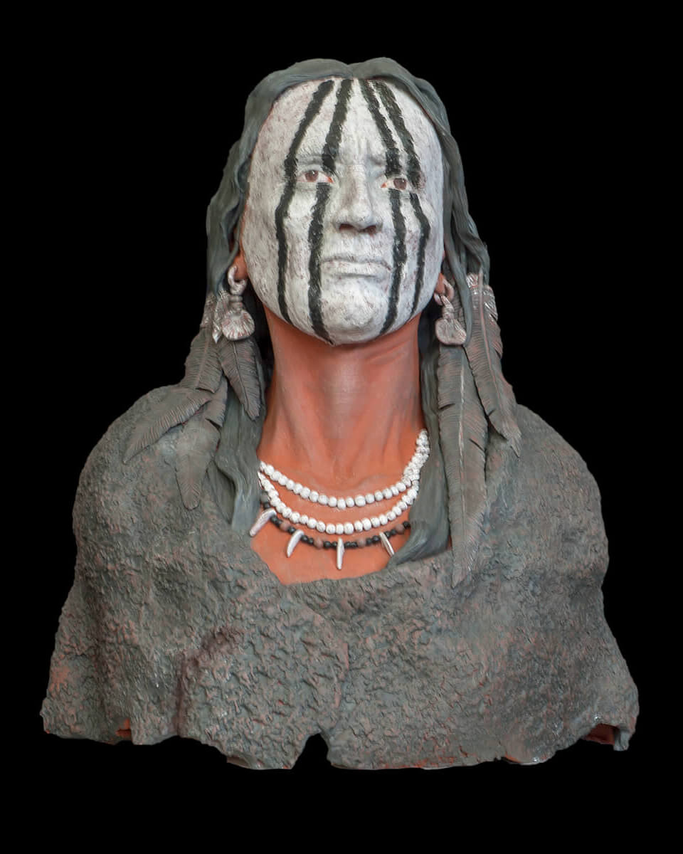 Figurative ceramic sculpture of an amaricain indian warrior