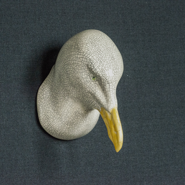 Figurative ceramic sculpture of a seagull head