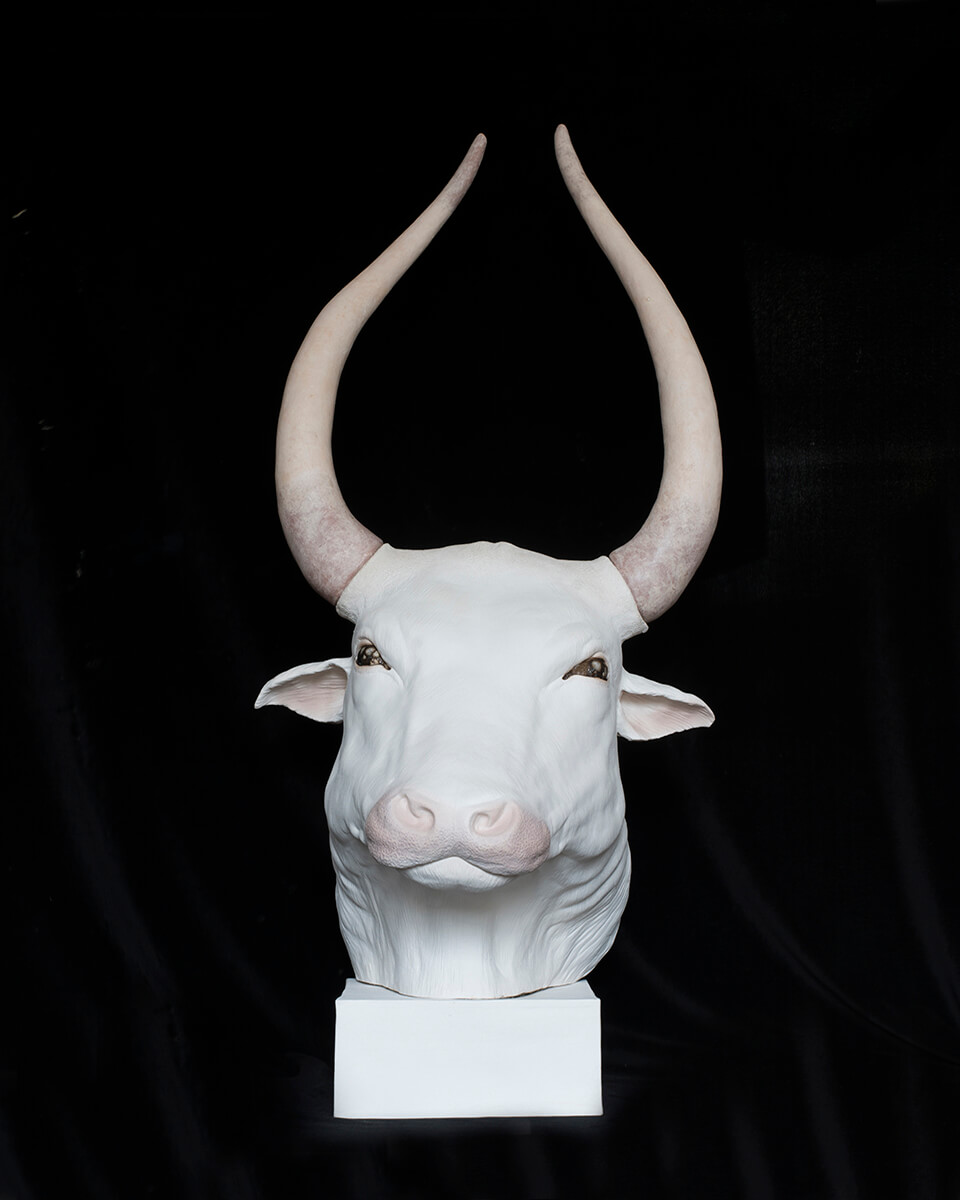 Figurative ceramic sculpture of an African Cow