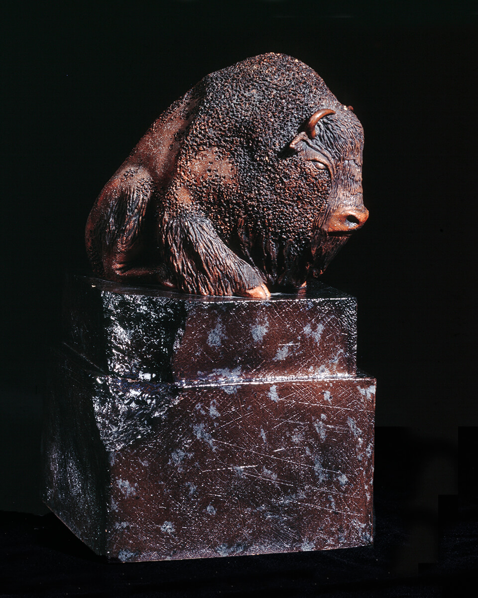 Figurative ceramic sculpture of a Bison